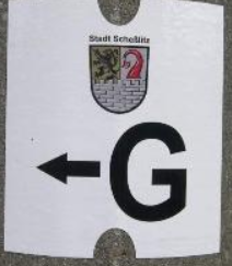 schwarzes_G_auf_weiss